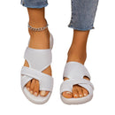 Danielle – Moderne slip on hjemmesko med krydsede strukturerede stropper