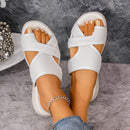 Danielle – Moderne slip on hjemmesko med krydsede strukturerede stropper