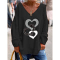 Mirella – Trendy oversized sweater med V-hals, hjerteprint og afslappet pasform