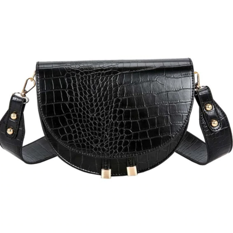 Isla – Kompakt crossbody-taske med præget tekstur og justerbare stropper