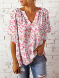 Tracy – Elegante bluse med blomstertryk med V udskæring og korte flydende ærmer