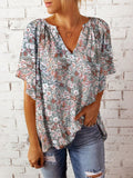 Tracy – Elegante bluse med blomstertryk med V udskæring og korte flydende ærmer