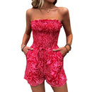 Loreen - Elastisk bandeau jumpsuit med blomstermønster og lommer