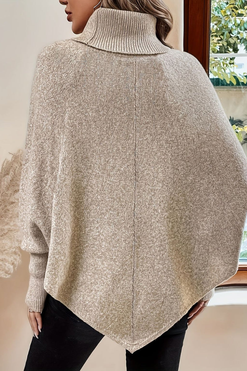 Viola – Hyggelig poncho-trøje med rullekrave og elegante knapdetaljer