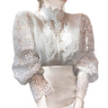 Clara – Chic bluse med lange ærmer og knap foran