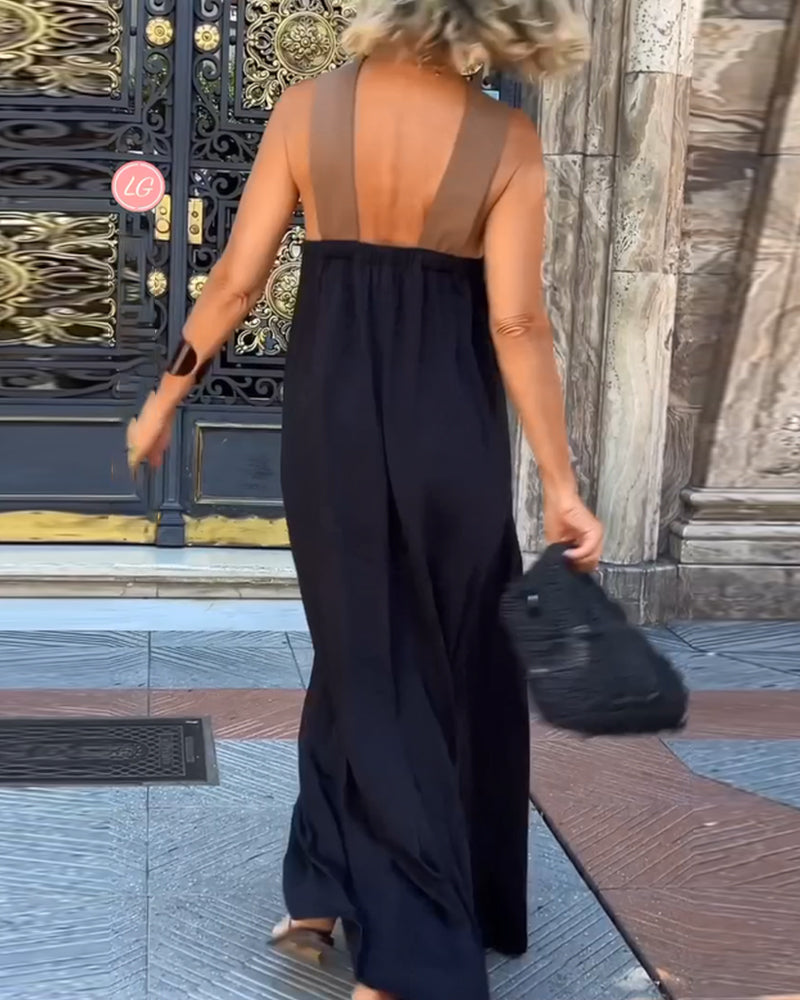 Kaia – Stilfuld Maxi-Kjole med Kors Bagsidedesign