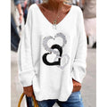 Mirella – Trendy oversized sweater med V-hals, hjerteprint og afslappet pasform