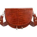 Isla – Kompakt crossbody-taske med præget tekstur og justerbare stropper