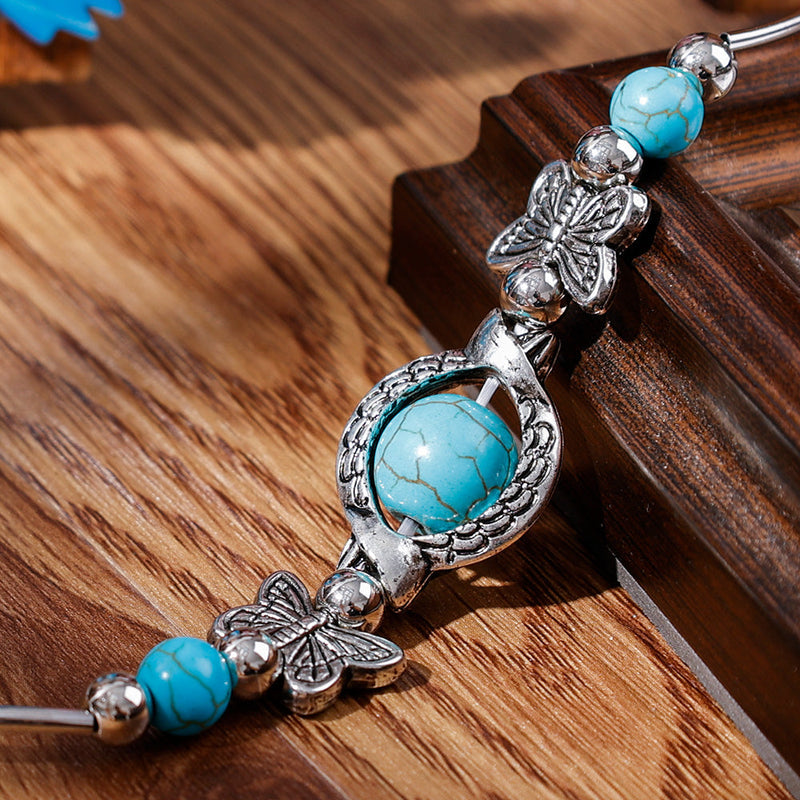 Maria – Moderne armbånd med sommerfuglevedhæng og justerbart design