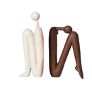 ShelfMuse – Dekorative bogstøtter med legende designs til hylder og skriveborde