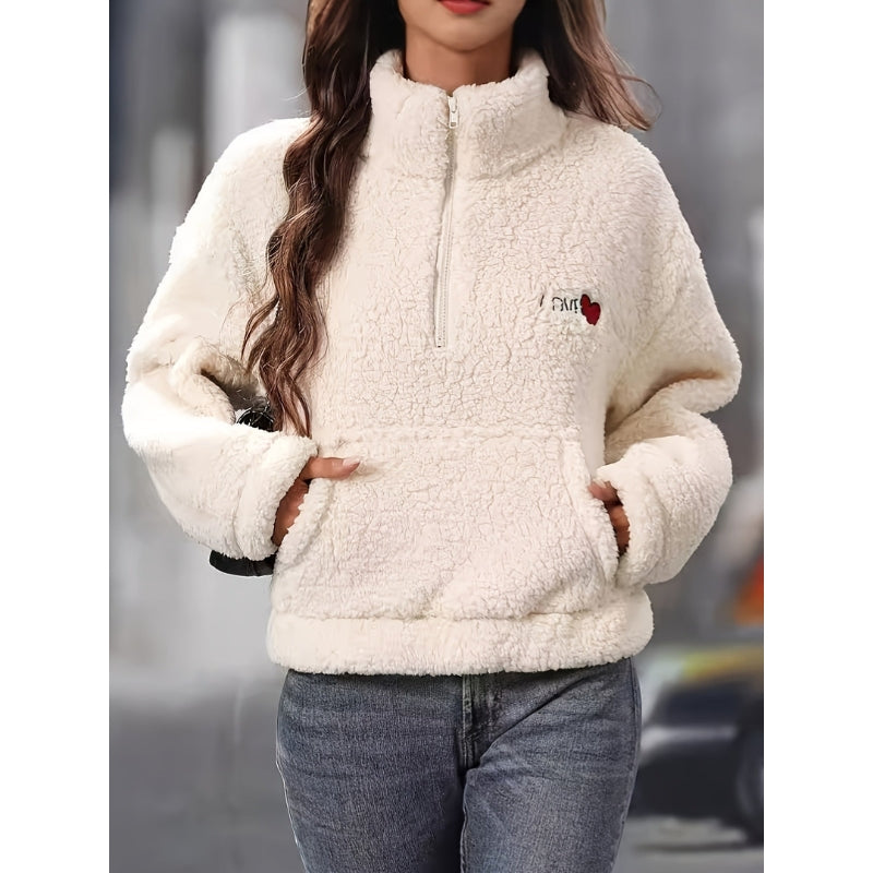 Amaya – Elegant pullover med halv lynlås, lange ærmer og forlomme