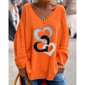 Mirella – Trendy oversized sweater med V-hals, hjerteprint og afslappet pasform