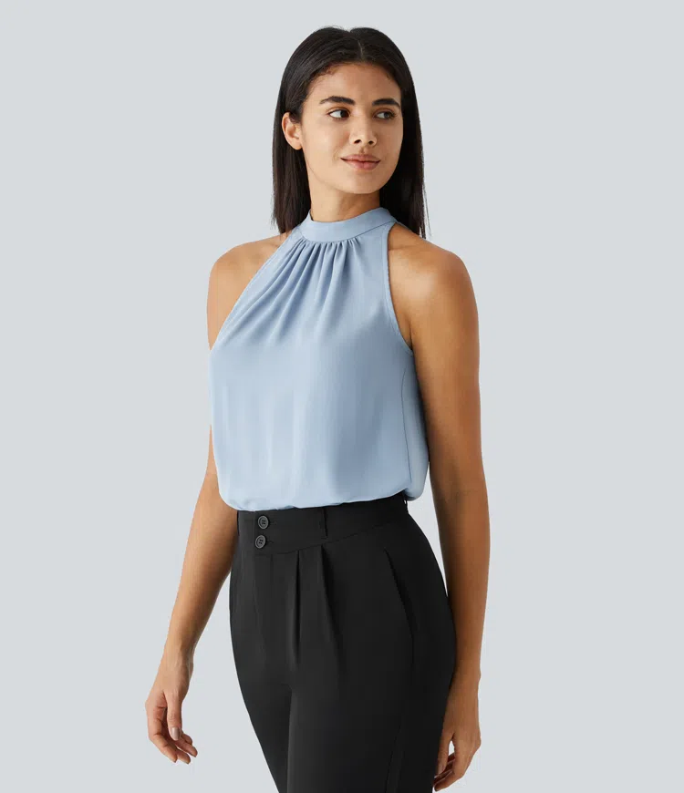 Nicole – Ærmeløs bluse med halterneck og afslappet pasform