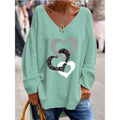 Mirella – Trendy oversized sweater med V-hals, hjerteprint og afslappet pasform