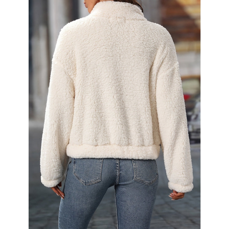 Amaya – Elegant pullover med halv lynlås, lange ærmer og forlomme