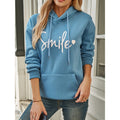 Angela – Legesyg oversized hættetrøje med Smile-grafik og afslappet pulloverdesign