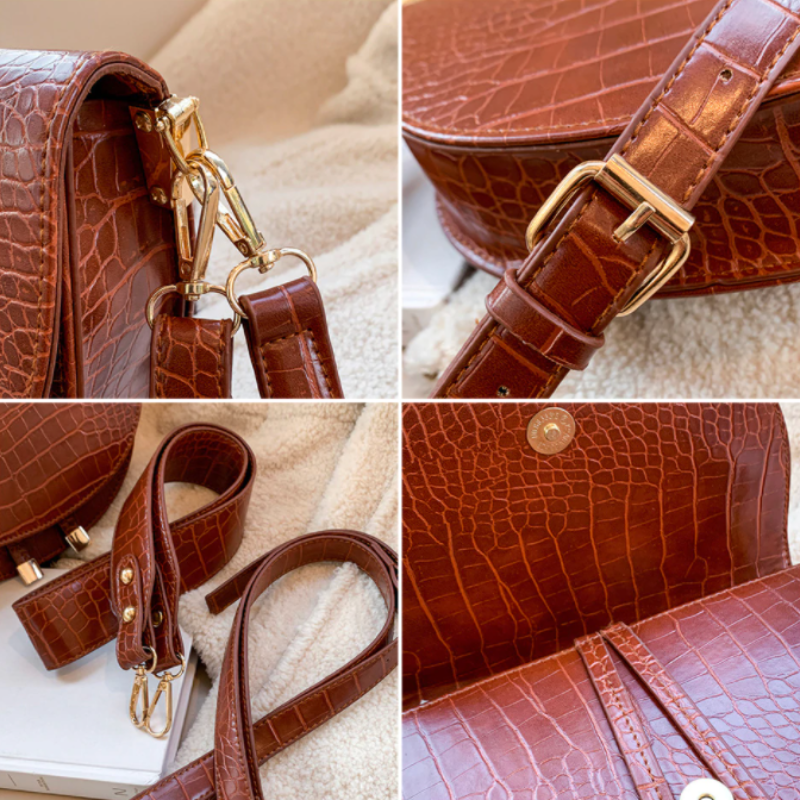Isla – Kompakt crossbody-taske med præget tekstur og justerbare stropper