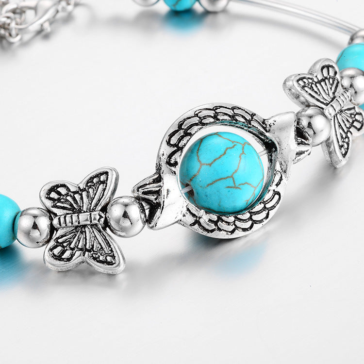 Maria – Moderne armbånd med sommerfuglevedhæng og justerbart design