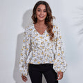 Natasha – Blomsterprintet bluse med V hals og vidde ærmer