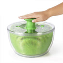 SpinTide – Salatslynge med integreret afløb og transparent skåldesign