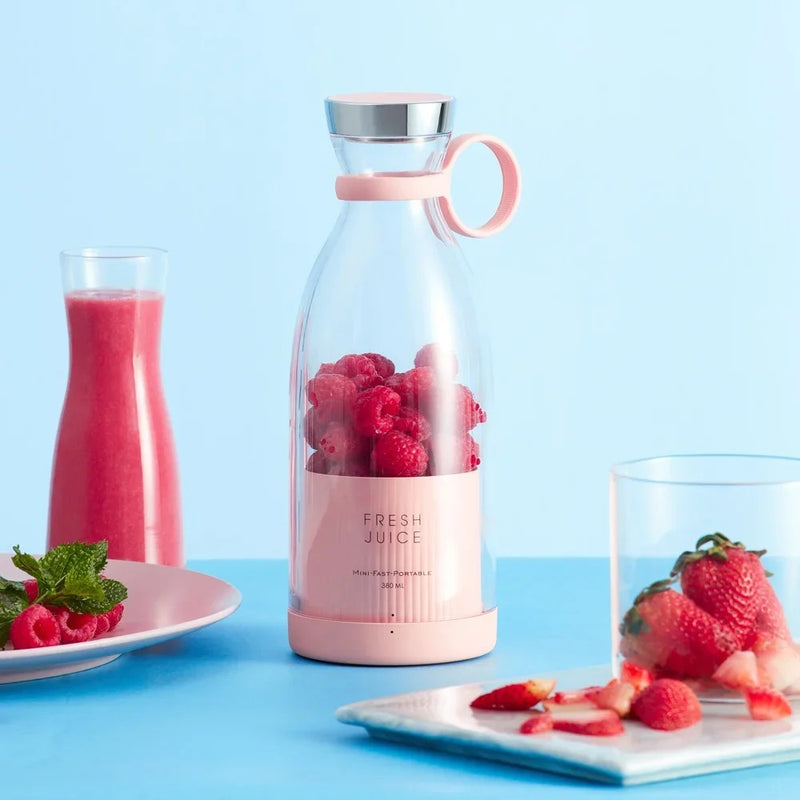 JuiceNest – Elektrisk juiceblender med betjening med én knap og bærbar