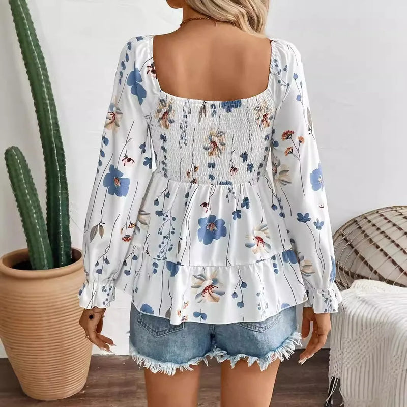 Linda - Stilfuld bluse med blomstermønster og lange ærmer