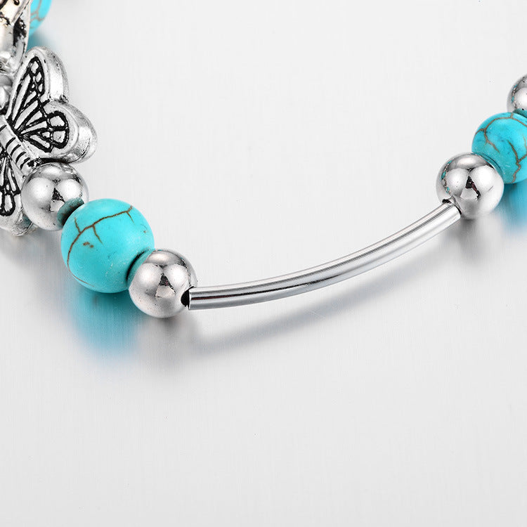 Maria – Moderne armbånd med sommerfuglevedhæng og justerbart design