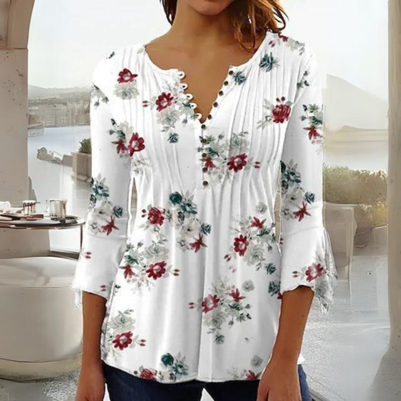 Olivia - Moderne bluse med blomsterprint og knapdetaljer