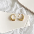Daisy – Luksus design hoop øreringe med glat skinnende finish