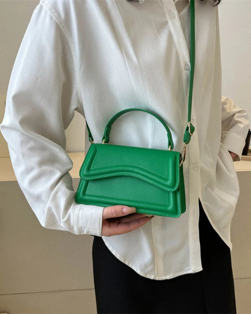 Nora - Moderne håndtaske med elegant design og rummeligt interiør