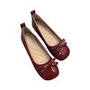 Eva - Slip på sko med slidstærk sål og sløjfedetalje