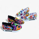 Amanda – Slip on sneakers med kileformet sål og blomsterbroderidetaljer