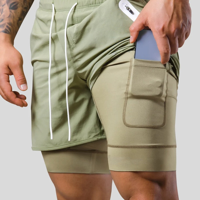 Jaxon – 2 i 1 sportsshorts med lynlåslommer og snøre i taljen
