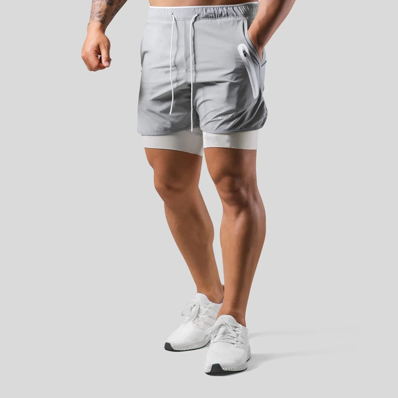 Jaxon – 2 i 1 sportsshorts med lynlåslommer og snøre i taljen