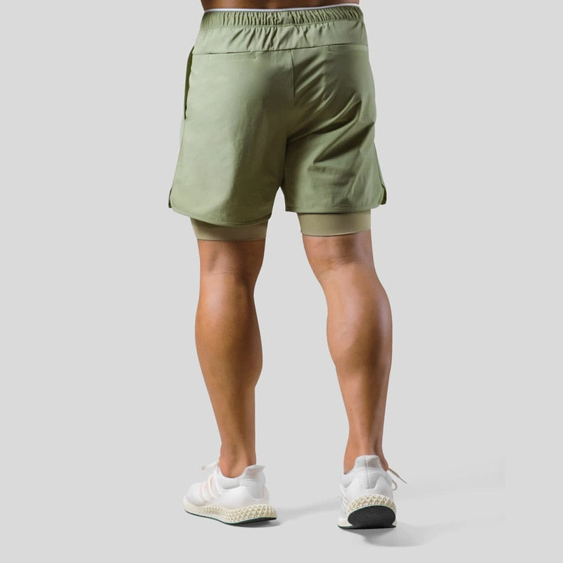 Jaxon – 2 i 1 sportsshorts med lynlåslommer og snøre i taljen