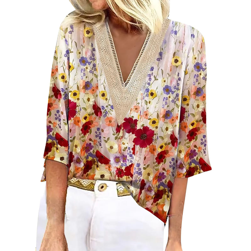 Joyce – Stilfuld bluse med blomsterprint korte ærmer og V-udskæring