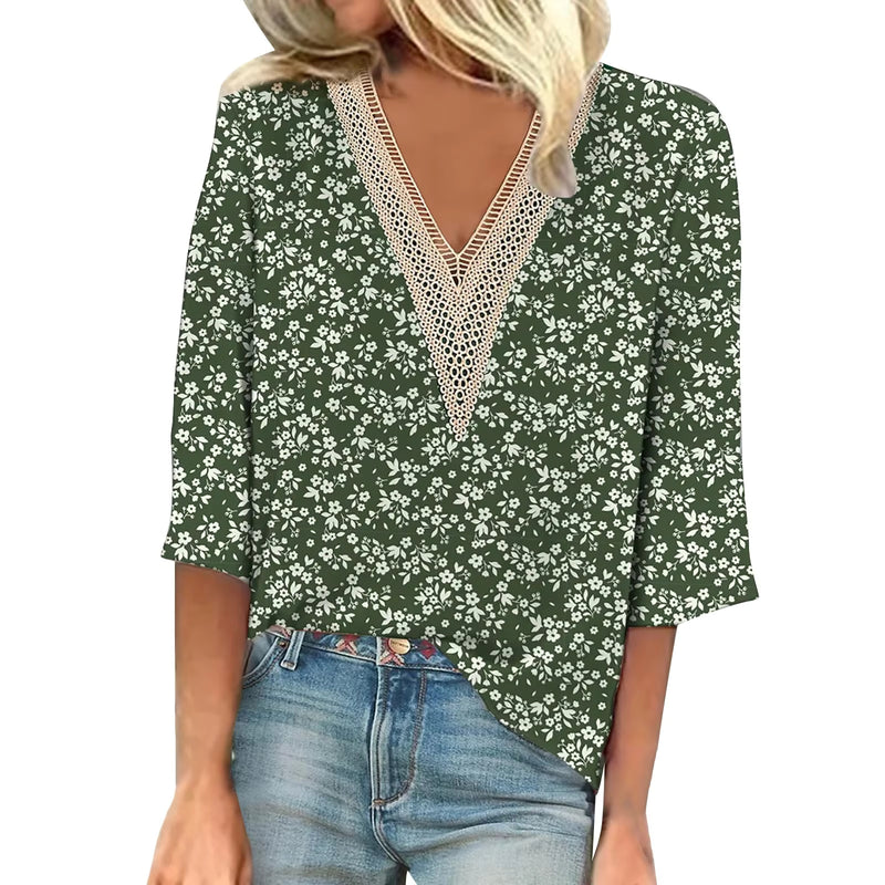 Joyce – Stilfuld bluse med blomsterprint korte ærmer og V-udskæring