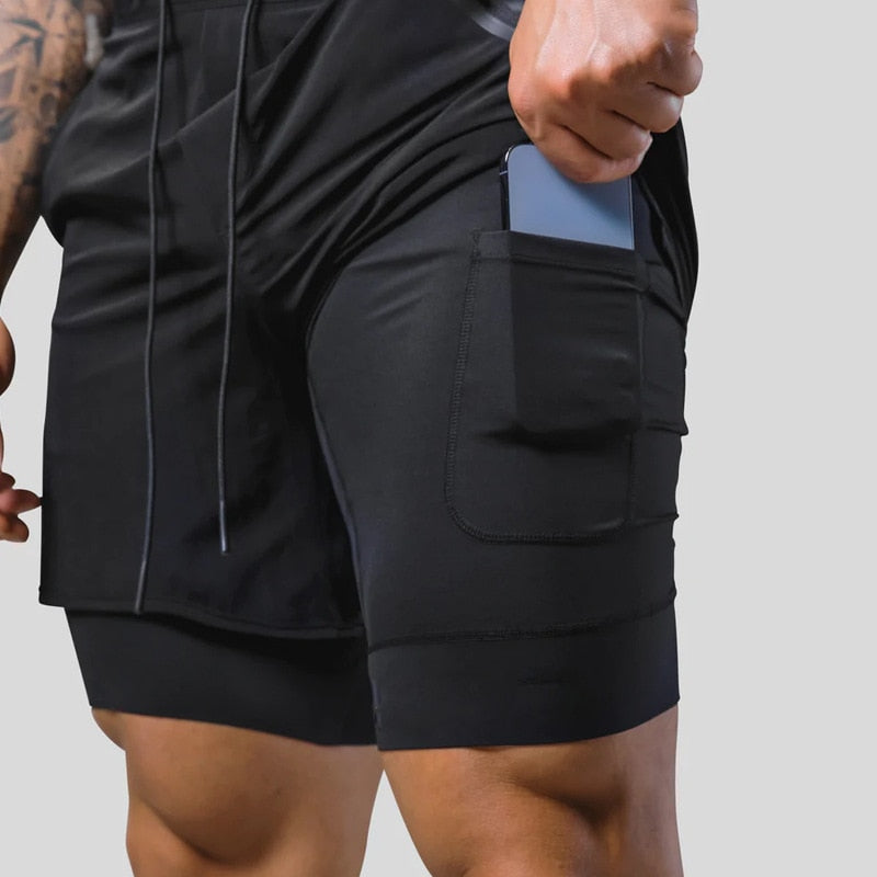 Jaxon – 2 i 1 sportsshorts med lynlåslommer og snøre i taljen