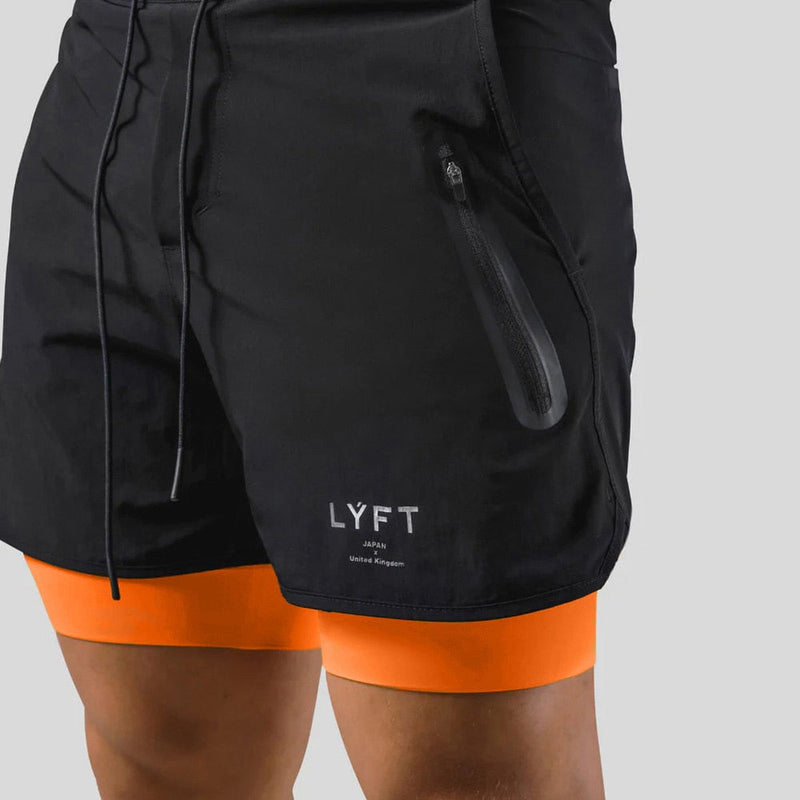 Jaxon – 2 i 1 sportsshorts med lynlåslommer og snøre i taljen
