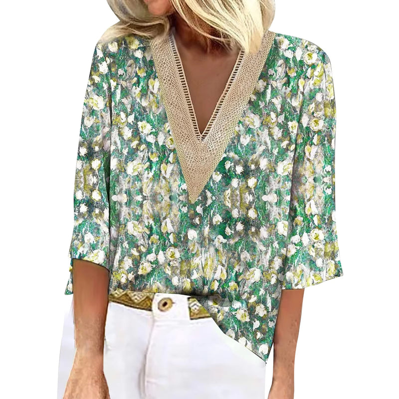 Joyce – Stilfuld bluse med blomsterprint korte ærmer og V-udskæring