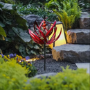 BreezeBloom – Vinddrevet havespinder med elegant roterende design