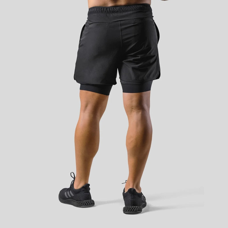 Jaxon – 2 i 1 sportsshorts med lynlåslommer og snøre i taljen