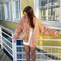 Luna – Oversized jakke med blomsterprint med lange ærmer og store frontlommer