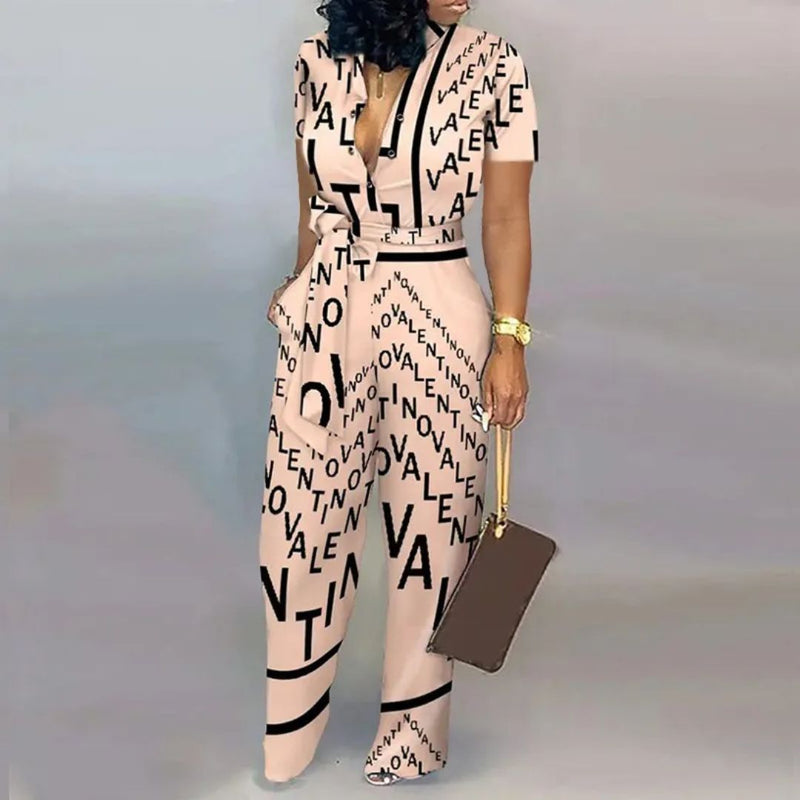 Sienna - Kortærmet jumpsuit med dyb V-hals og talje med bælte