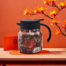 TeaGlide - Blomsterisoleret tetermos med finmasket filter