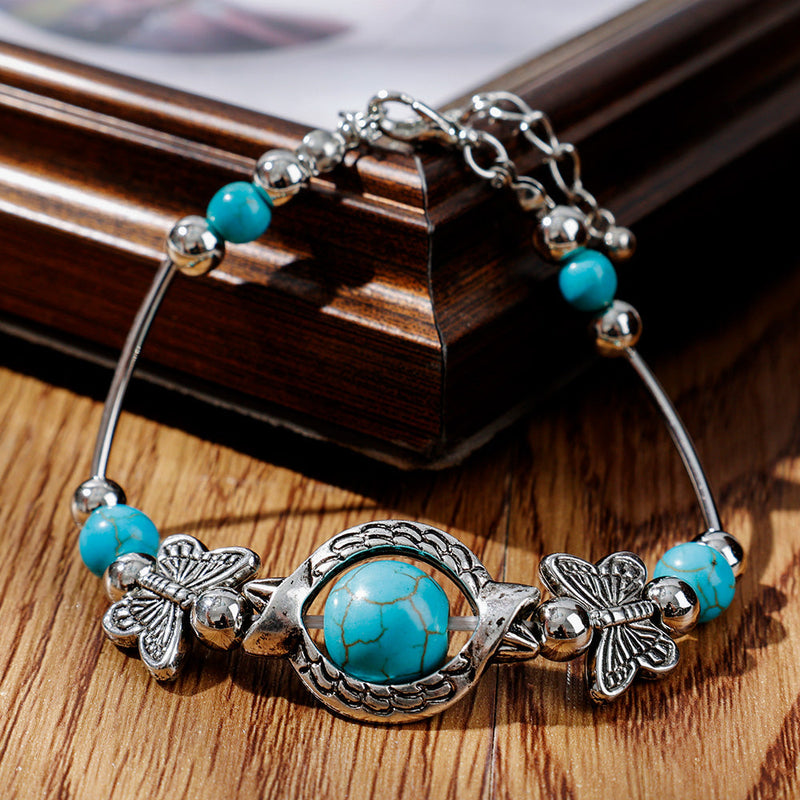 Maria – Moderne armbånd med sommerfuglevedhæng og justerbart design