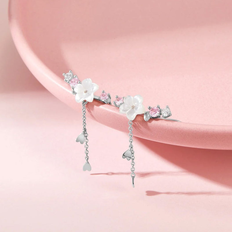 Riley – Elegant ørering med blomsterkvast og unikt design