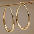 Maria – Stilfulde ovale hoop øreringe med sikker lukning og slående look
