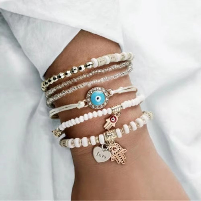 Malinda – Boheme Charm Armbåndssæt med en blanding af perlebesatte armbånd og alsidigt design
