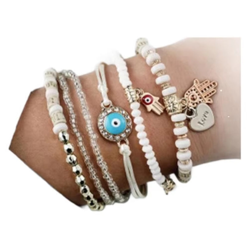 Malinda – Boheme Charm Armbåndssæt med en blanding af perlebesatte armbånd og alsidigt design